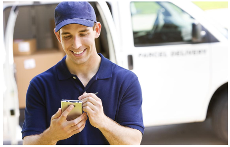 Courier Guy Entering Data Through Smartphone